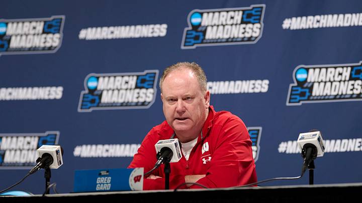 Mar 18, 2026; Portland, OR, USA; Wisconsin Badgers head coach Greg Gard answers questions during a press conference before a practice session ahead of the first round of the men's 2026 NCAA Tournament at Moda Center. Mandatory Credit: Troy Wayrynen-Imagn Images
