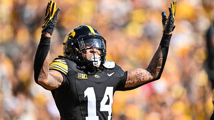 Sep 5, 2026; Iowa City, Iowa, USA;  Iowa Hawkeyes wide receiver Tony Diaz (14) reacts after scoring a touchdown against the Northern Illinois Huskies during the first quarter at Kinnick Stadium.  Mandatory Credit: Jeffrey Becker-Imagn Images