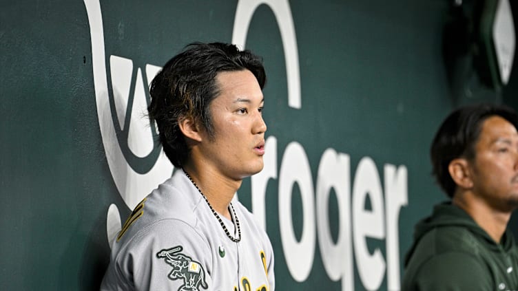 Apr 22, 2023; Arlington, Texas, USA; Oakland Athletics starting pitcher Shintaro Fujinami (11) sits