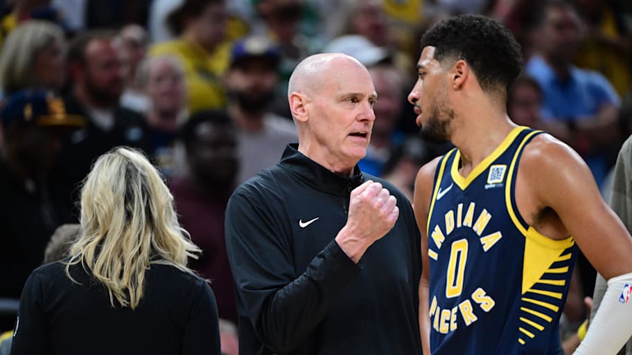 Indiana Pacers Head Coach Rick Carlisle shares a moment with Indiana Pacers guard Tyrese Haliburton. | Marc Lebryk-Imagn Images