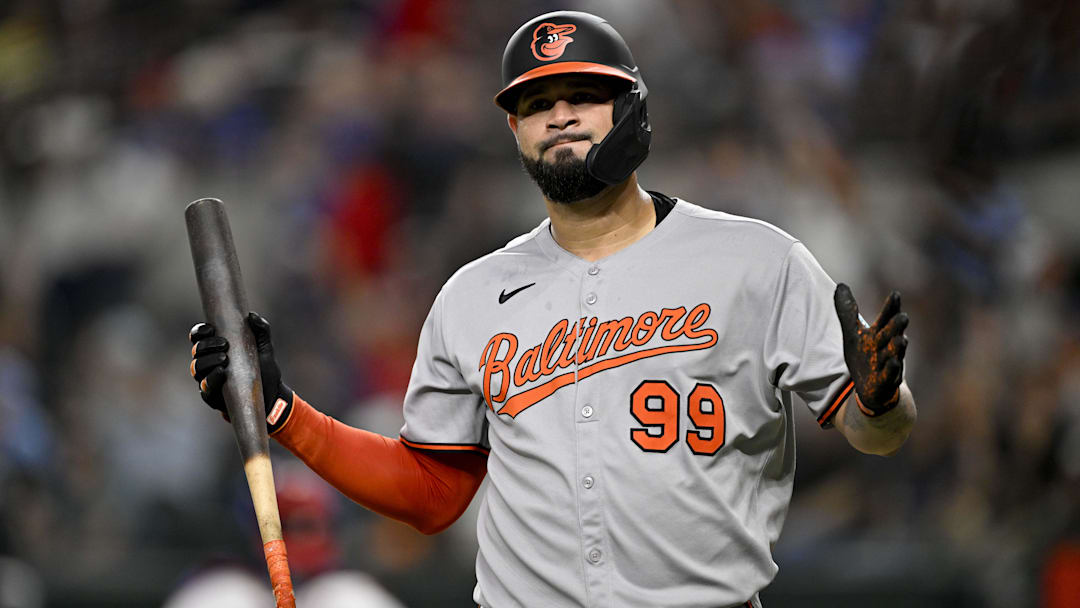 Jun 30, 2025; Arlington, Texas, USA; Baltimore Orioles designated hitter Gary Sanchez (99) reacts to striking out to end the inning against the Texas Rangers during the seventh inning at Globe Life Field. Mandatory Credit: Jerome Miron-Imagn Images