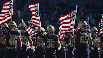 Nov 16, 2024; Annapolis, Maryland, USA;  Navy Midshipmen takes the field before the game against the Tulane Green Wave at Navy-Marine Corps Memorial Stadium. Mandatory Credit: Tommy Gilligan-Imagn Images
