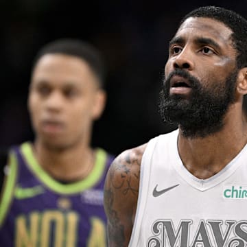 Feb 21, 2025; Dallas, Texas, USA; Dallas Mavericks guard Kyrie Irving (11) looks on during the second half against the New Orleans Pelicans at the American Airlines Center. Mandatory Credit: Jerome Miron-Imagn Images
