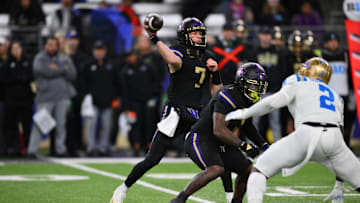 Nov 15, 2024; Seattle, Washington, USA; Washington Huskies quarterback Will Rogers (7) passes the ball against the UCLA Bruins during the first half at Alaska Airlines Field at Husky Stadium. Mandatory Credit: Steven Bisig-Imagn Images
