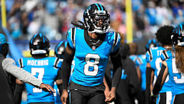 Oct 26, 2025; Charlotte, North Carolina, USA; Carolina Panthers cornerback Jaycee Horn (8) runs on to the field before the game at Bank of America Stadium. Mandatory Credit: Bob Donnan-Imagn Images