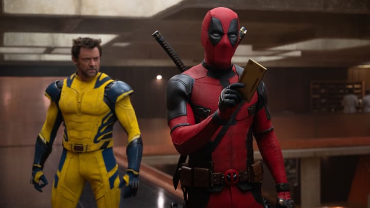 (L-R): Hugh Jackman as Wolverine/Logan and Ryan Reynolds as Deadpool/Wade Wilson in 20th Century Studios/Marvel Studios' DEADPOOL & WOLVERINE. Photo by Jay Maidment. © 2024 20th Century Studios / © and ™ 2024 MARVEL.