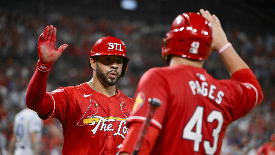 Aug 16, 2024; St. Louis, Missouri, USA; St. Louis Cardinals left fielder Tommy Pham (29) is congratulated by catcher Pedro Pages (43) after scoring against the Los Angeles Dodgers during the sixth inning at Busch Stadium. Mandatory Credit: Jeff Curry-USA TODAY Sports Aug 16, 2024; St. Louis, Missouri, USA; St. Louis Cardinals left fielder Tommy Pham (29) is congratulated by catcher Pedro Pages (43) after scoring against the Los Angeles Dodgers during the sixth inning at Busch Stadium. Mandatory Credit: Jeff Curry-USA TODAY Sports