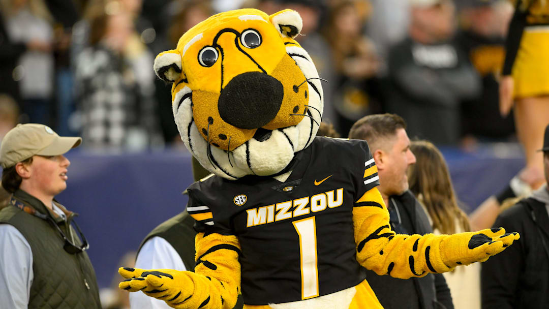 Dec 30, 2024; Nashville, TN, USA;  Missouri Tigers mascot Truman dances of the sideline against the Iowa Hawkeyes during the second half at Nissan Stadium. Mandatory Credit: Steve Roberts-Imagn Images