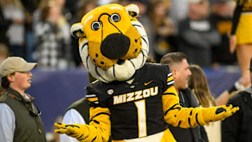 Dec 30, 2024; Nashville, TN, USA;  Missouri Tigers mascot Truman dances of the sideline against the Iowa Hawkeyes during the second half at Nissan Stadium. Mandatory Credit: Steve Roberts-Imagn Images