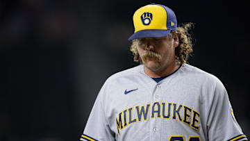 Aug 18, 2023; Arlington, Texas, USA; Milwaukee Brewers relief pitcher Andrew Chafin (32) walks off the field after he pitches against the Texas Rangers during the ninth inning at Globe Life Field. Mandatory Credit: Jerome Miron-Imagn Images