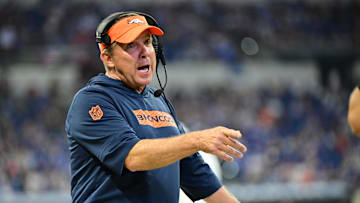 Aug 11, 2024; Indianapolis, Indiana, USA; Denver Broncos Head Coach Sean Payton shares a word with a referee during the second half against the Indianapolis Colts at Lucas Oil Stadium. Mandatory Credit: Marc Lebryk-Imagn Images