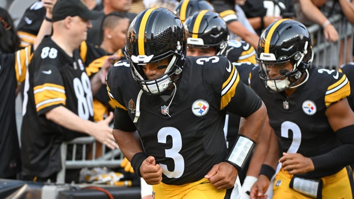 Aug 9, 2024; Pittsburgh, Pennsylvania, USA; Pittsburgh Steelers quarterback Russell Wilson (3) and Justin Fields (2) take the field for pre-game against the Houston Texans at Acrisure Stadium. Mandatory Credit: Barry Reeger-USA TODAY Sports