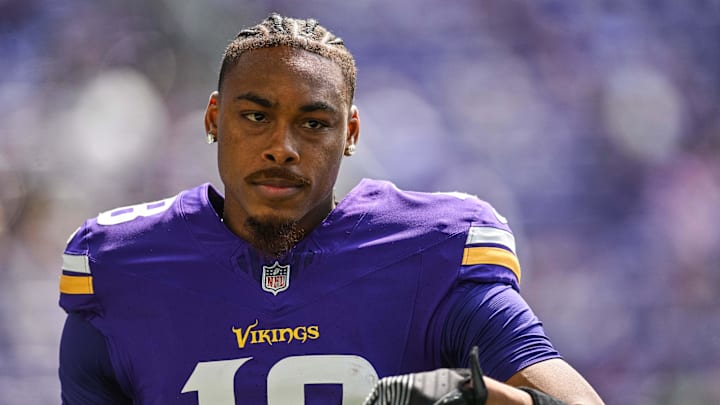 Minnesota Vikings wide receiver Justin Jefferson warms up before a game.