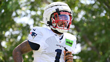 Jul 28, 2025; Foxborough, MA, USA; New England Patriots wide receiver Ja'Lynn Polk (1) heads to the practice fields for training camp at Gillette Stadium. Mandatory Credit: Eric Canha-Imagn Images