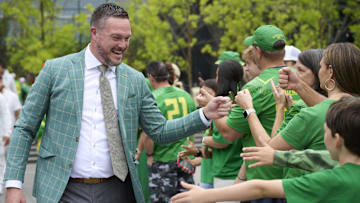 Sep 6, 2025; Eugene, Oregon, USA; Oregon Ducks head coach Dan Lanning greets fans before a game against the Oklahoma State Cowboys at Autzen Stadium. Mandatory Credit: Troy Wayrynen-Imagn Images
