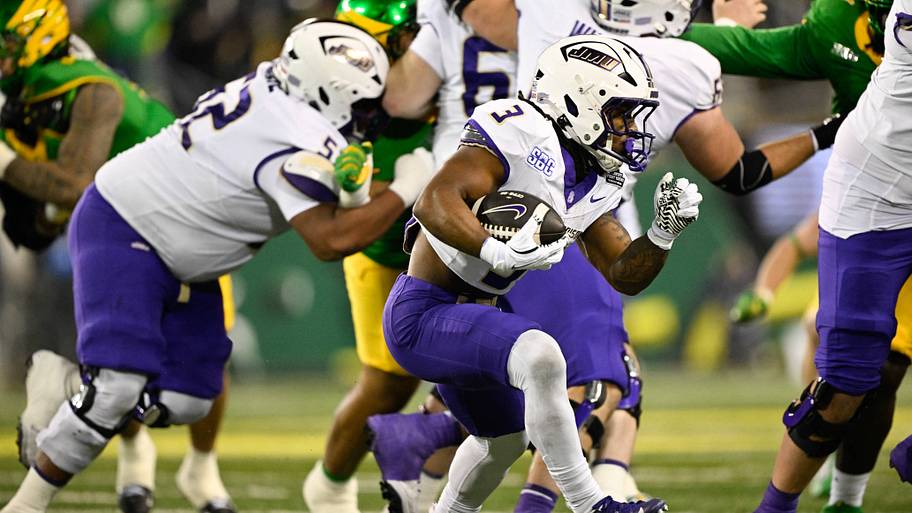 James Madison Dukes running back Wayne Knight rushes during the second quarter.