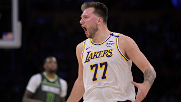 Apr 19, 2025; Los Angeles, California, USA; Los Angeles Lakers guard Luka Doncic (77) reacts after not getting a foul call in the second half against the Minnesota Timberwolves at Crypto.com Arena. Mandatory Credit: Jayne Kamin-Oncea-Imagn Images