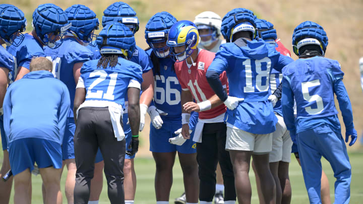 May 28, 2024; Thousand Oaks, CA, USA; Los Angeles Rams quarterback Jimmy Garoppolo (11) talks to players in the huddle during OTAs at the team training facility at California Lutheran University. Mandatory Credit: Jayne Kamin-Oncea-USA TODAY Sports