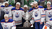 The Edmonton Oilers pose with the trophy after winning the Western Conference Final of the 2025 Stanley Cup Playoffs at American Airlines Center.