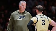 Purdue Boilermakers head coach Matt Painter talks with guard Braden Smith