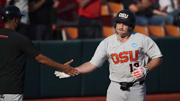 Jun 1, 2025; Corvallis, OR, USA; Oregon St. catcher Wilson Weber (18) celebrates hitting a home run during the ninth inning against Saint Mary's at the NCAA Corvallis Regional at Goss Stadium. Mandatory Credit: Troy Wayrynen-Imagn Images