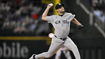 Aug 4, 2025; Arlington, Texas, USA; New York Yankees relief pitcher Jake Bird (59) pitches against the Texas Rangers during the tenth inning at Globe Life Field. Mandatory Credit: Jerome Miron-Imagn Images