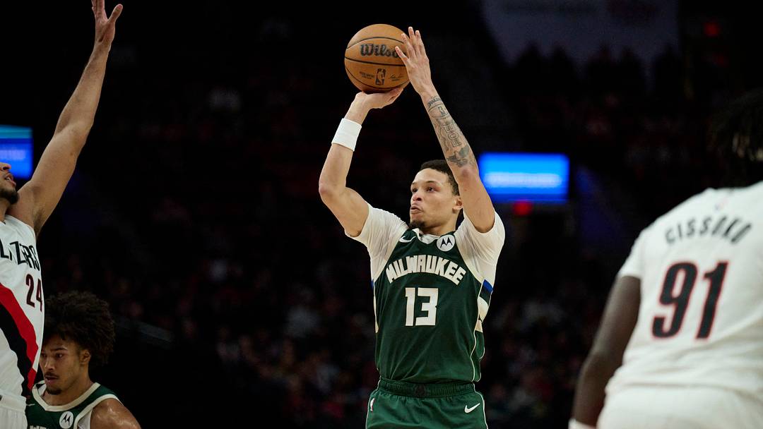 Mar 25, 2026; Portland, Oregon, USA; Milwaukee Bucks guard Ryan Rollins (13) shoots a basket during the second half against Portland Trail Blazers forward Kris Murray (24) at Moda Center. Mandatory Credit: Troy Wayrynen-Imagn Images