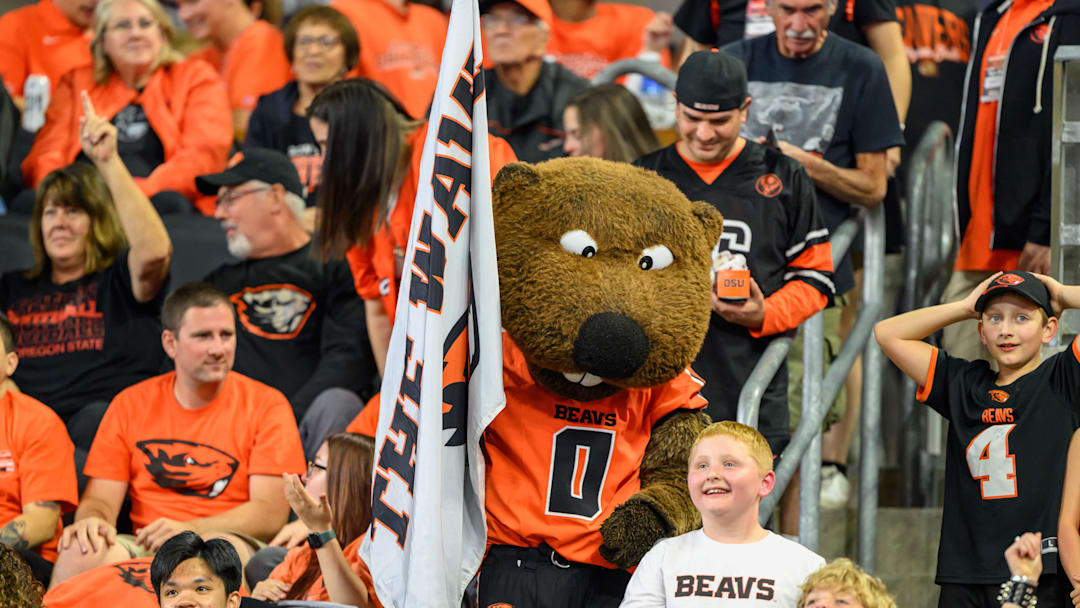 Sep 26, 2025; Corvallis, Oregon, USA; Oregon State Beavers mascot Benny Beaver interacts with fans during the second quarter against the Houston Cougars at Reser Stadium. Mandatory Credit: Craig Strobeck-Imagn Images