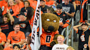 Sep 26, 2025; Corvallis, Oregon, USA; Oregon State Beavers mascot Benny Beaver interacts with fans during the second quarter against the Houston Cougars at Reser Stadium. Mandatory Credit: Craig Strobeck-Imagn Images