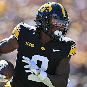 Sep 7, 2024; Iowa City, Iowa, USA; Iowa Hawkeyes running back Kaleb Johnson (2) runs for a 27 yard touchdown against the Iowa State Cyclones during the first quarter at Kinnick Stadium. Mandatory Credit: Jeffrey Becker-Imagn Images