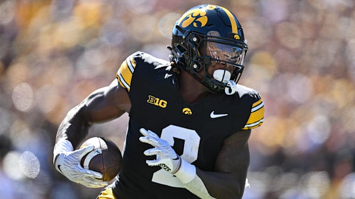 Sep 7, 2024; Iowa City, Iowa, USA; Iowa Hawkeyes running back Kaleb Johnson (2) runs for a 27 yard touchdown against the Iowa State Cyclones during the first quarter at Kinnick Stadium. Mandatory Credit: Jeffrey Becker-Imagn Images