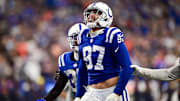 Sep 22, 2024; Indianapolis, Indiana, USA; Indianapolis Colts defensive end Laiatu Latu (97) celebrates a sack during the second half against the Chicago Bears at Lucas Oil Stadium. Mandatory Credit: Marc Lebryk-Imagn Images

