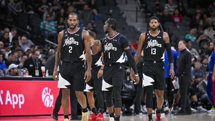 Jan 20, 2023; San Antonio, Texas, USA; LA Clippers forward Kawhi Leonard (2) and guard Reggie Jackson (1) and guard Paul George (13) walk back onto the court during the second half against the San Antonio Spurs at the AT&T Center. Mandatory Credit: Jerome Miron-USA TODAY Sports