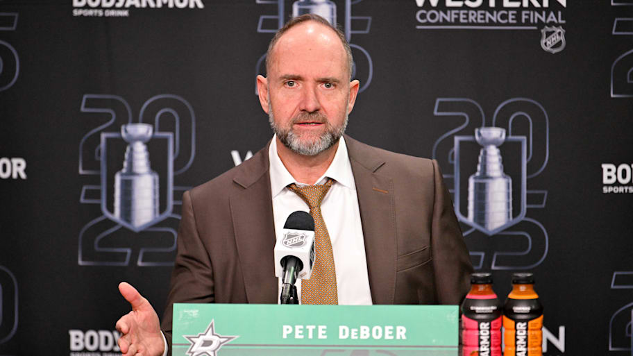 Peter DeBoer addresses reporters after the Stars' loss to the Oilers. | Jerome Miron-Imagn Images