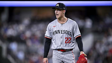 Aug 15, 2024; Arlington, Texas, USA; Minnesota Twins relief pitcher Griffin Jax (22) yells to his team as he comes off the field after pitching against the Texas Rangers during the game at Globe Life Field. Mandatory Credit: Jerome Miron-Imagn Images