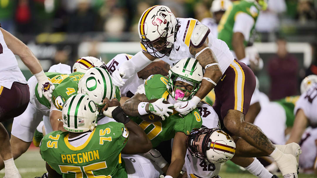 Nov 14, 2025; Eugene, Oregon, USA; Oregon Ducks running back Jordon Davison (0) scores a touchdown during the first half against the Minnesota Golden Gophers at Autzen Stadium. Mandatory Credit: Troy Wayrynen-Imagn Images
