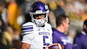 Oct 26, 2024; Iowa City, Iowa, USA; Northwestern Wildcats quarterback Mike Wright (5) looks on before a game against the Iowa Hawkeyes at Kinnick Stadium. Mandatory Credit: Jeffrey Becker-Imagn Images