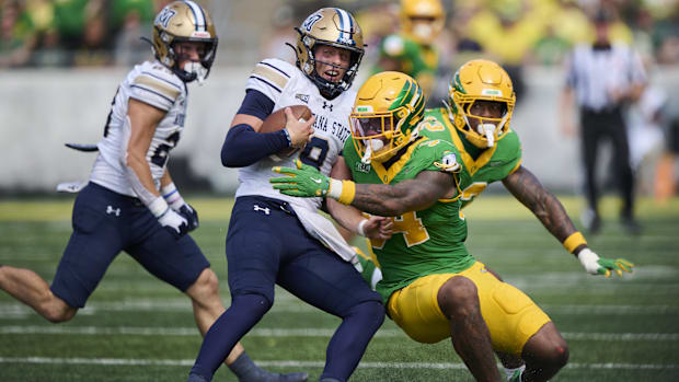 jerry mixon oregon ducks dan lanning oklahoma state cowboys linebacker tosh lupoi brian michalowski peyton woodyard defense