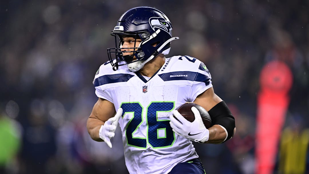 Seattle Seahawks running back Zach Charbonnet runs the ball against the Chicago Bears.
