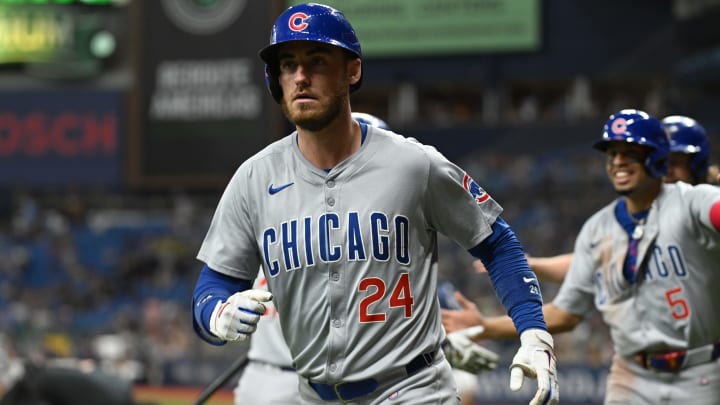 Jun 12, 2024; St. Petersburg, Florida, USA; Chicago Cubs right fielder Cody Bellinger (24) reacts after hitting a three run home run in the seventh inning against the Tampa Bay Rays at Tropicana Field.