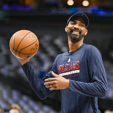 Jan 7, 2023; Dallas, Texas, USA; New Orleans Pelicans player development coach and former NBA player Corey Brewer warms up with the Pelicans before the game between the Dallas Mavericks and the New Orleans Pelicans at the American Airlines Center. 