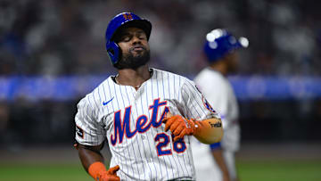 Aug 28, 2025; New York City, New York, USA; New York Mets outfielder Cedric Mullins (28) reacts after hitting a line drive for an out against the Miami Marlins during the sixth inning  at Citi Field. Mandatory Credit: John Jones-Imagn Images
