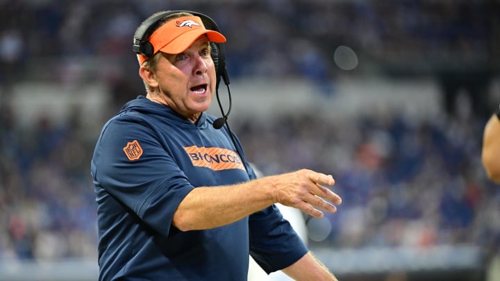 Aug 11, 2024; Indianapolis, Indiana, USA; Denver Broncos Head Coach Sean Payton shares a word with a referee during the second half against the Indianapolis Colts  at Lucas Oil Stadium. Mandatory Credit: Marc Lebryk-USA TODAY Sports