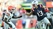 Oct 26, 2025; Foxborough, Massachusetts, USA;  New England Patriots wide receiver Mack Hollins (13) runs with the ball against Cleveland Browns cornerback Denzel Ward (21) during the fourth quarter at Gillette Stadium. Mandatory Credit: Brian Fluharty-Imagn Images