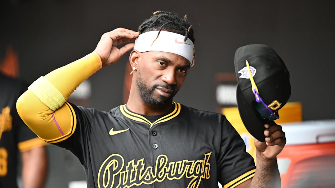 Sep 11, 2025; Baltimore, Maryland, USA;  Pittsburgh Pirates designated hitter Andrew McCutchen (22) stands in the dugout before the game between the Baltimore Orioles and the Pittsburgh Pirates at Oriole Park at Camden Yards. Mandatory Credit: James A. Pittman-Imagn Images