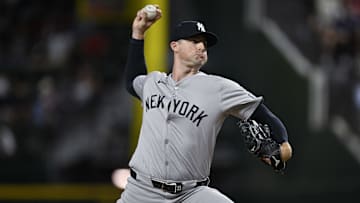 Sep 2, 2024; Arlington, Texas, USA; New York Yankees relief pitcher Clay Holmes (35) pitches against the Texas Rangers during the ninth inning at Globe Life Field. Mandatory Credit: Jerome Miron-Imagn Images