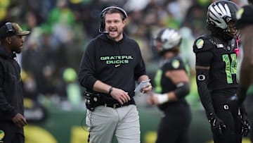 Oct 25, 2025; Eugene, Oregon, USA; Oregon Ducks head coach Dan Lanning instructs players during the first half against the Wisconsin Badgers at Autzen Stadium. Mandatory Credit: Troy Wayrynen-Imagn Images