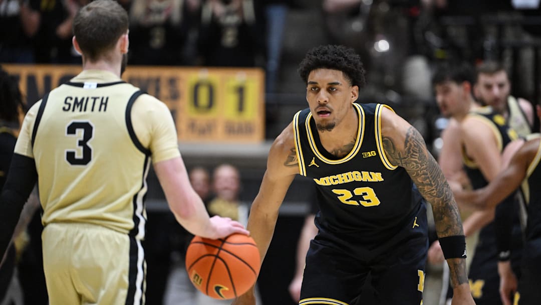 Michigan Wolverines forward Yaxel Lendeborg defends against Purdue Boilermakers guard Braden Smith