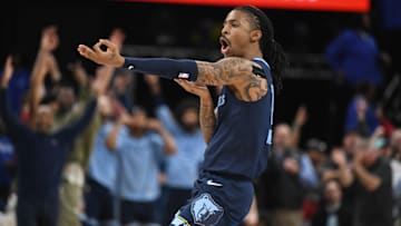 Mar 12, 2025; Memphis, Tennessee, USA; Memphis Grizzlies point guard Ja Morant (12) celebrates a game ending three point make in the fourth quarter of the game at FedExForum. Mandatory Credit: Matthew Smith-Imagn Images