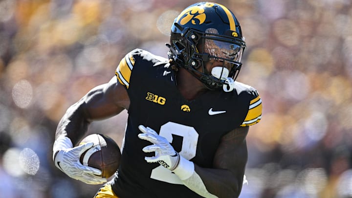 Sep 7, 2024; Iowa City, Iowa, USA; Iowa Hawkeyes running back Kaleb Johnson (2) runs for a 27 yard touchdown against the Iowa State Cyclones during the first quarter at Kinnick Stadium. Mandatory Credit: Jeffrey Becker-Imagn Images